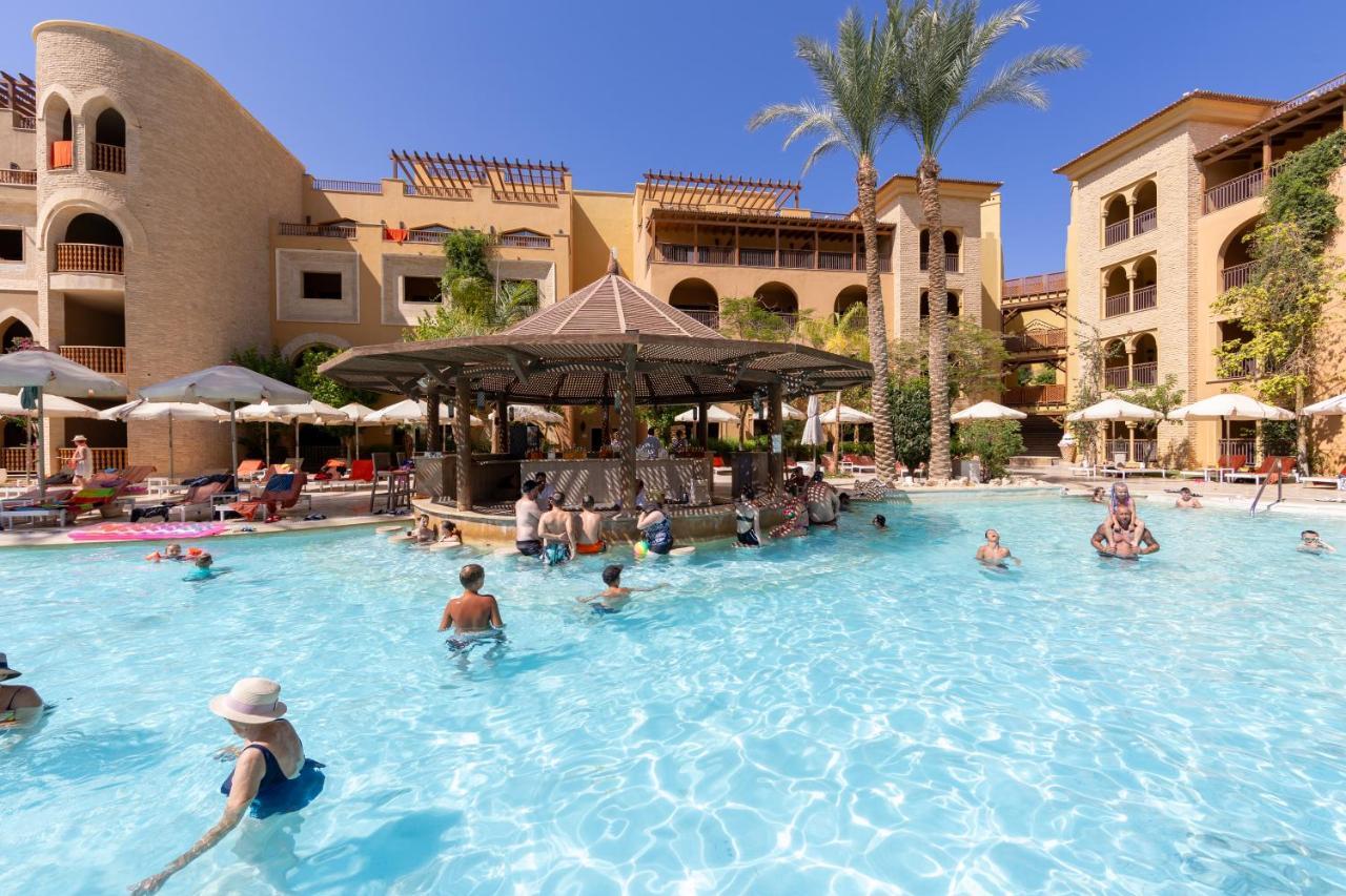 Hotel Grand Waterworld Makadi Family Star - Couples And Families Only Hurghada Esterno foto The swimming pool at the Hilton Sharm El-Sheikh